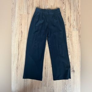 Black wool trousers